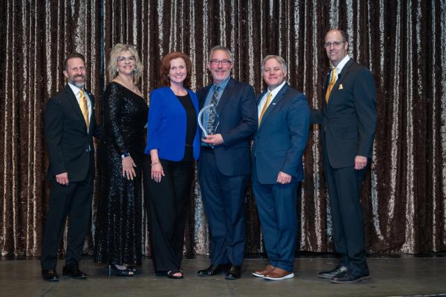 The NetEffect team accepting the HCC Economic Development and Small Business Award