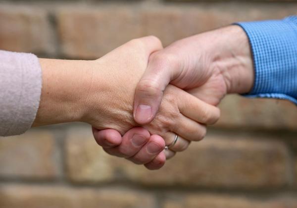 Two people shaking hands