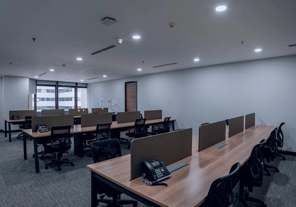 Desk telephones on workstations in an open office